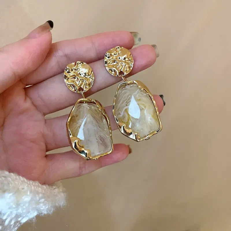 A pair of resin geometry earrings